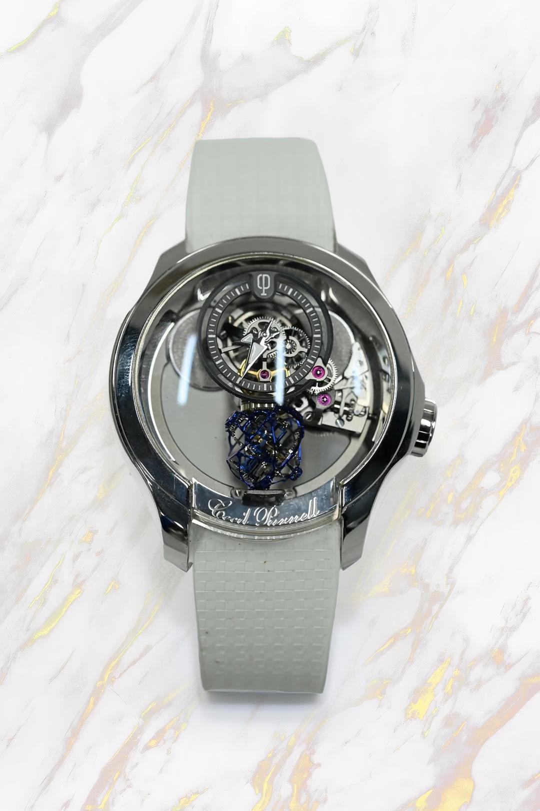 Tourbillon movement suspended in an open sapphire field
